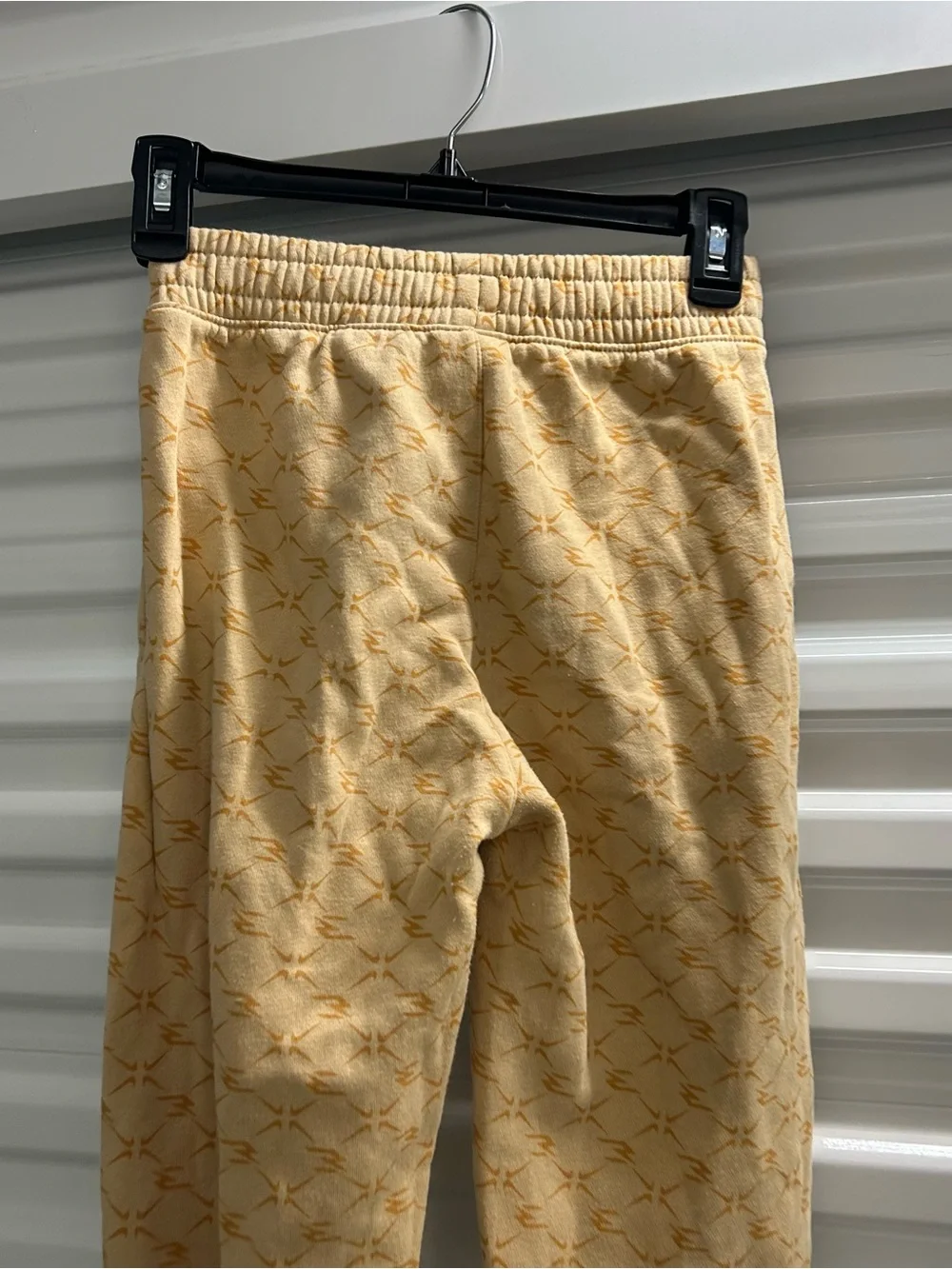 Nike Youth Light Yellow Patterned Joggers with Black Swoosh